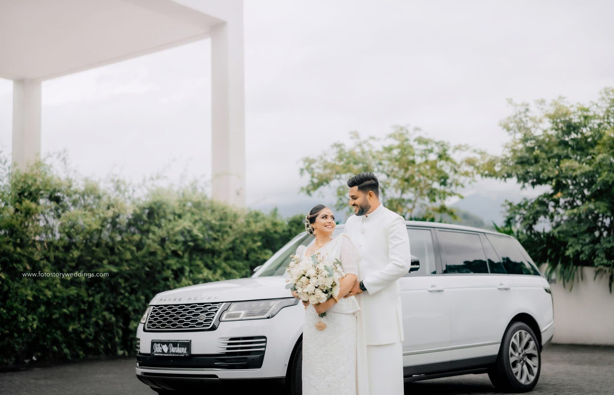 Outdoor wedding ceremony arch with floral decorations